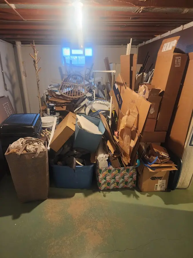 Roll-off dumpster container at job site for 2 Yard Dumpster Rental in Mount Holly